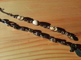 2 Armbänder in rosé/kupfer