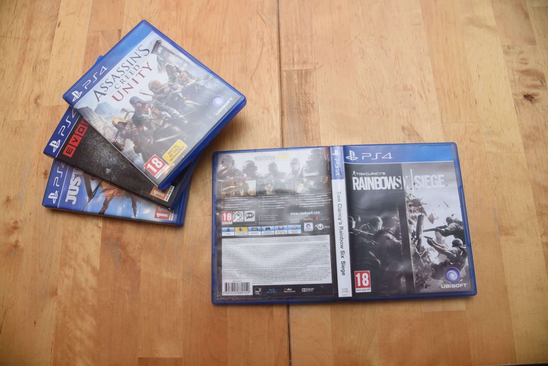 Jeux: Assassin's Creed+Rainbow Six+Just Cause3+Evolve – D'occasion à Frenkendorf par gelbeZinnie 3