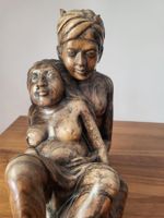 Frau bei Geburt