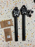 Two (2) Cane Creek Thudbuster seat posts with accessories