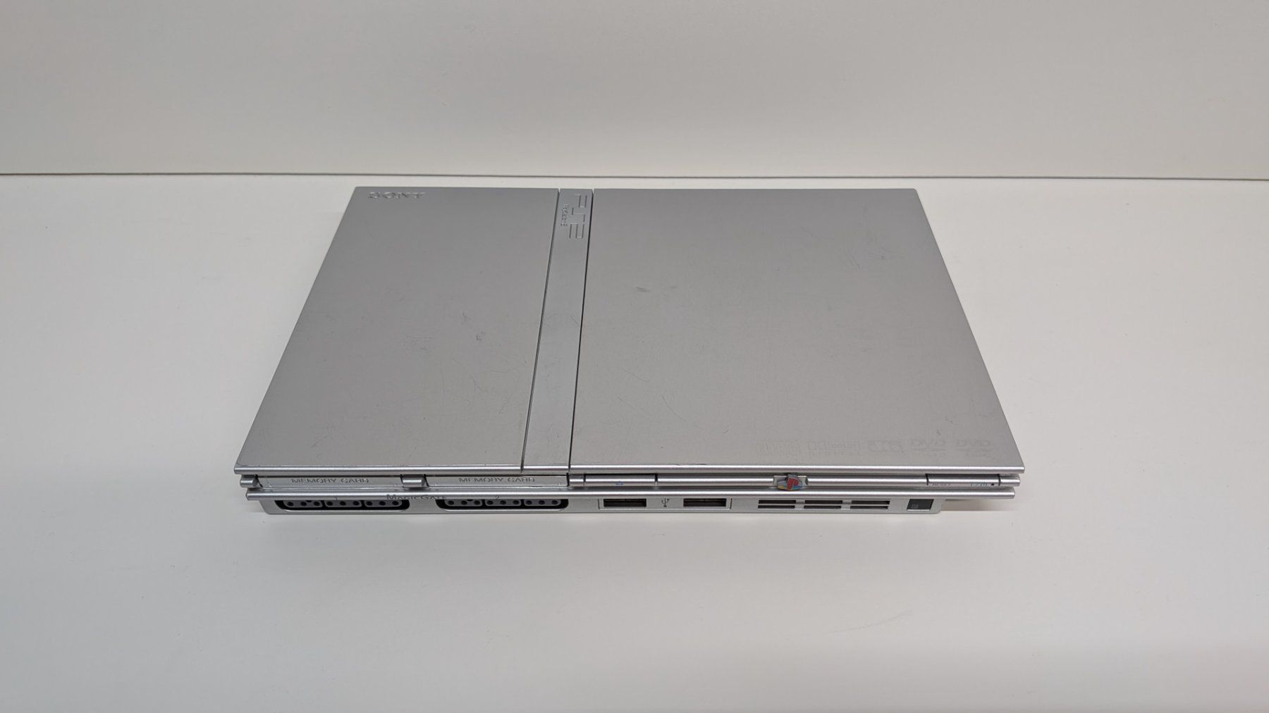Sony Konsolen: PlayStation 2 Slim Silver mit Controller ORIGINAL – Gebraucht aus Menziken von mame18 2