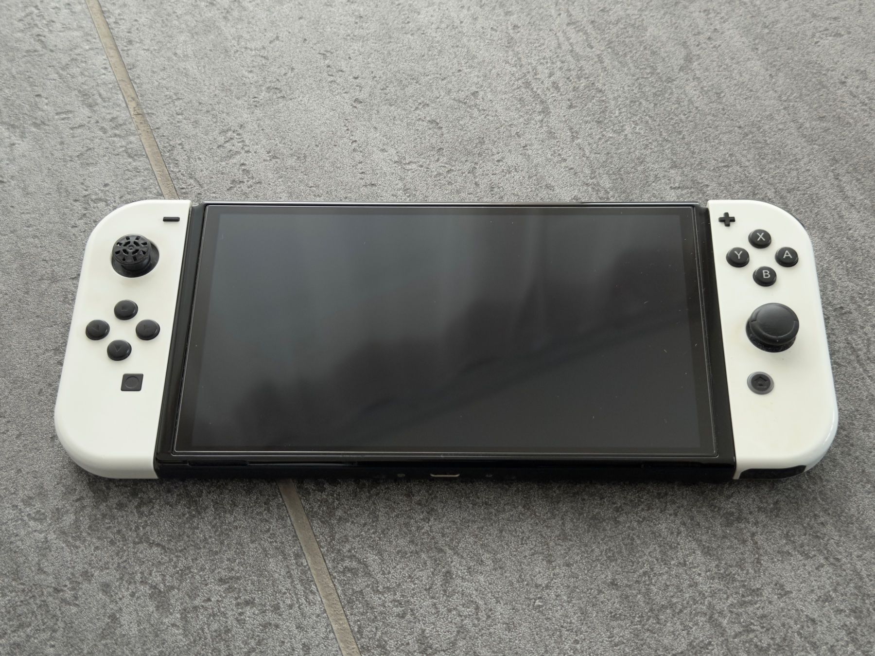 Nintendo Konsolen: Nintendo Switch OLED mit viel Zubehör – Gebraucht aus Zürich von odinjer