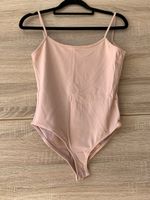 Body rose avec dos ouvert
