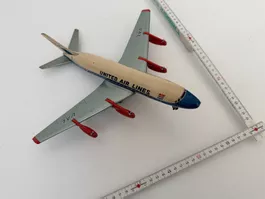 Blechflugzeug DC-8 United antik