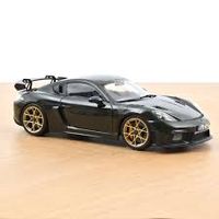 PORSCHE CAYMAN GT4 RS WEISSACH 2023 BLACK 1:18 NOREV