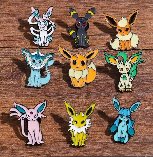 Pokémon Plaketten & Abzeichen: Pokémon 9 Eeveelutions Pin's – Neu und originalverpackt aus Genève von Resko 1