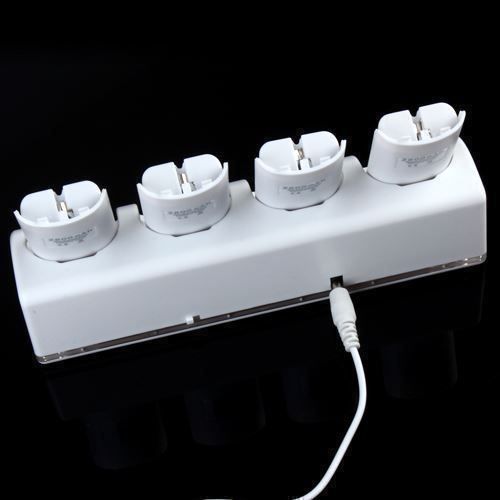 Caricabatterie: Wii Controller Ladestatio mit 4 Akku – Nuovo (secondo la descrizione) da Thun venduto da thunshop 3