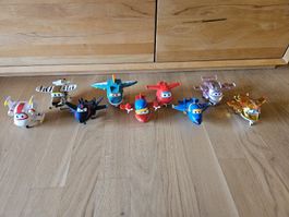 9 Super Wings Transform-a-Bots Figuren (je 12–13 cm gross)