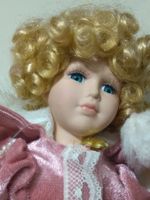 Porzellanpuppe im rosa Kleid – ca. 40 cm – guter Zustand
