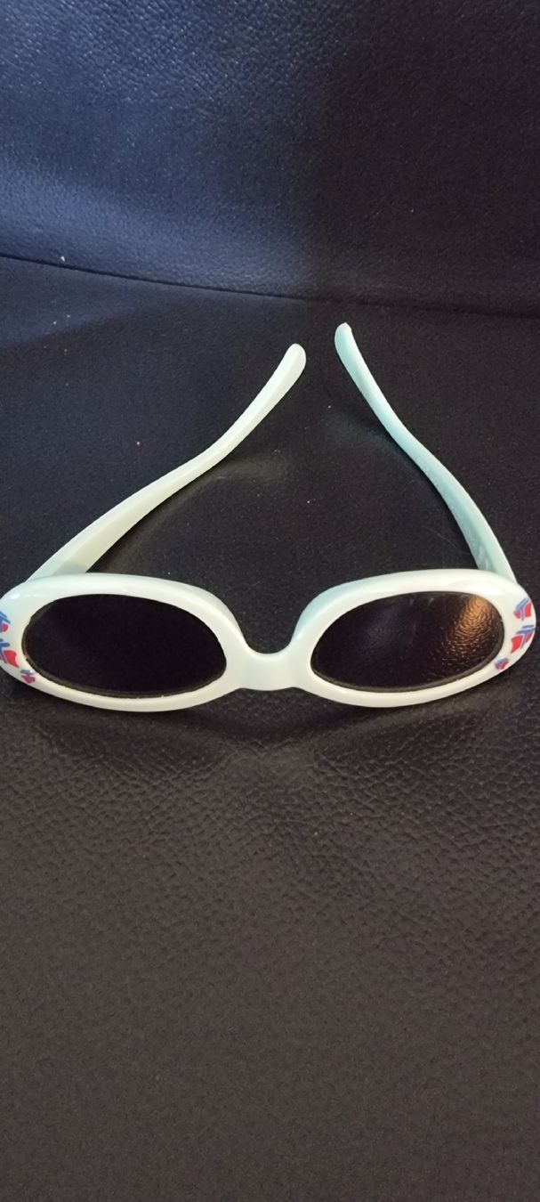 Chicco Lunettes & Verres: Kinder Sonnenbrille Chicco, hellblau mit Schiffmuster – D'occasion à Rupperswil par greenangel4
