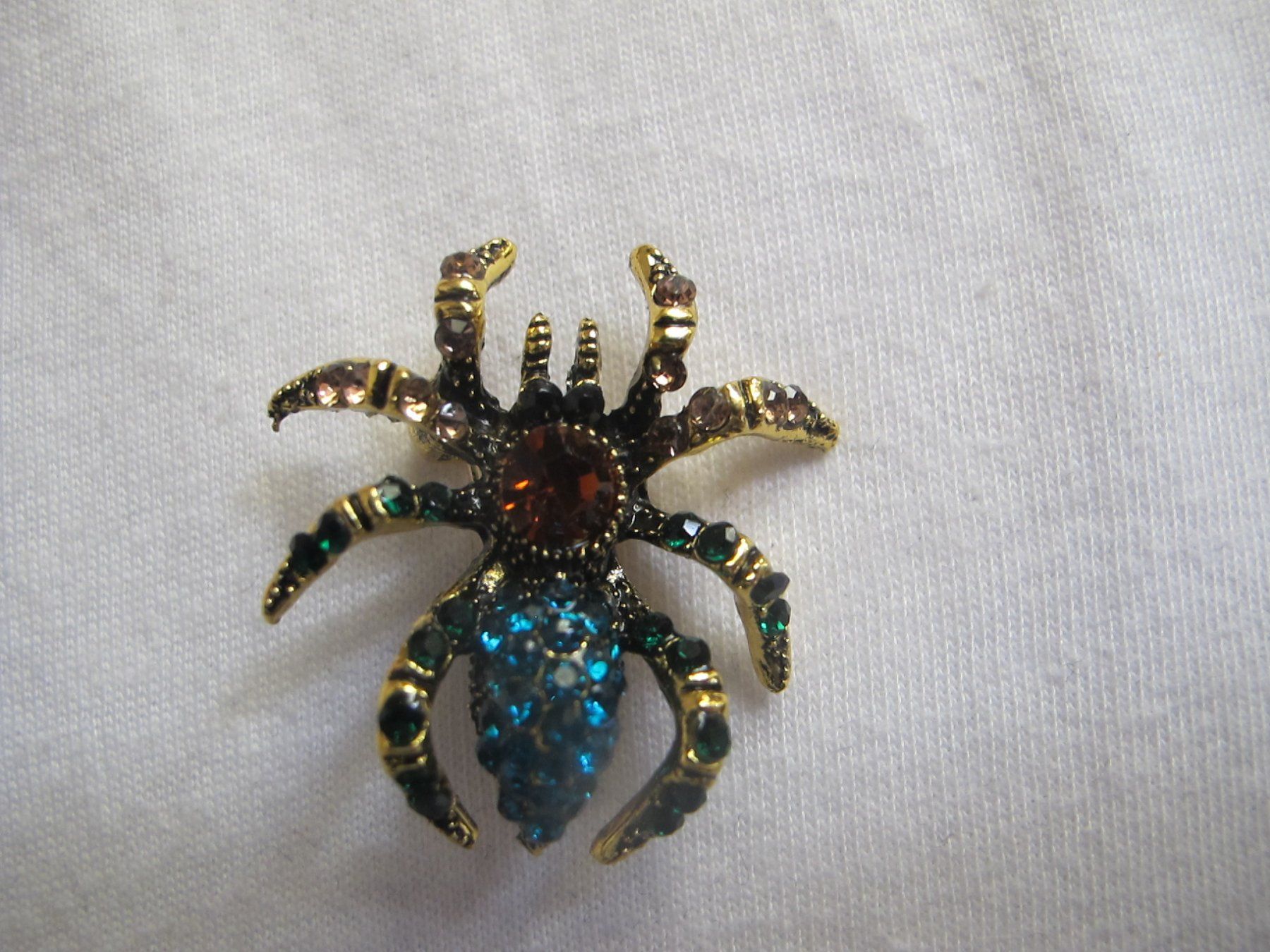 Spille & Fermagli: Elegante Spinnenbrosche mit Strass Steinen, Goldfarben – Nuovo (secondo la descrizione) da Löhningen venduto da Chimae67