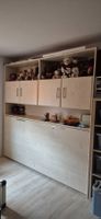 Schrankbett mit seitlichem Bett/Matratze