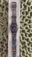 Montre Swatch fleurs motif, boîte, neuf