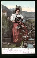 Junge Frau in Berner Tracht mit Blumen