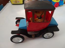 Altes Spielzeugauto mit Hundefigur Pluto - Disney