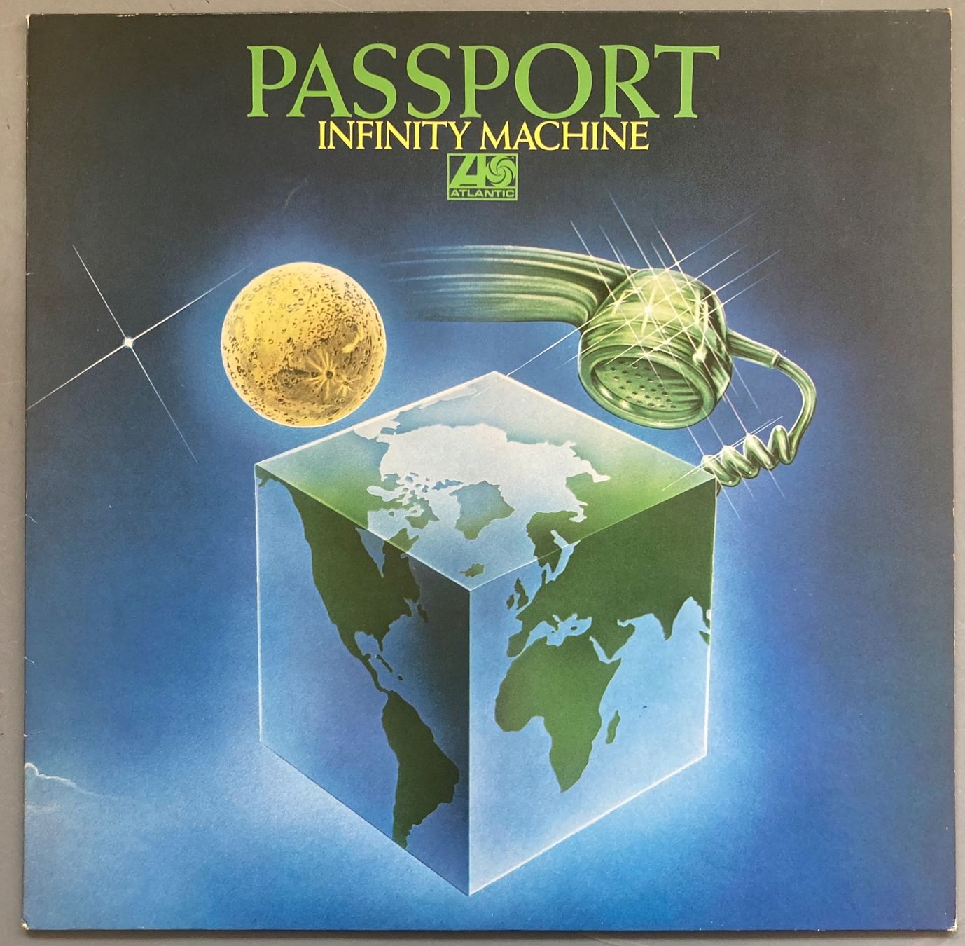 Vinyles: PASSPORT - INFINITY MACHINE – D'occasion à Poliez-Pittet par Newtown-Records