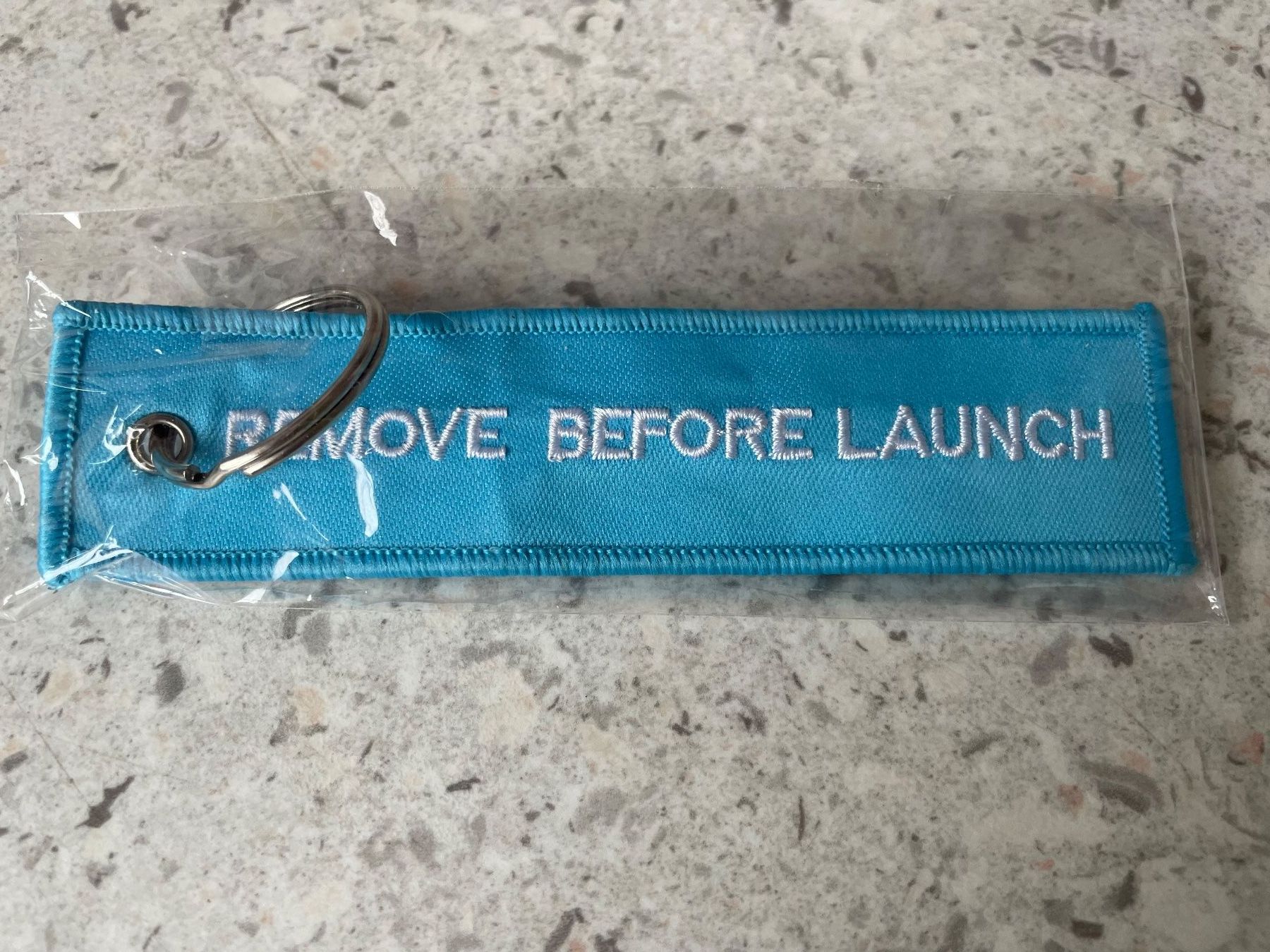 Portachiavi: 1 Schlüsselanhänger REMOVE BEFORE LAUNCH - Ruag Space – Nuovo e nell'imballaggio originale da Hochfelden venduto da aviatikboerse_top
