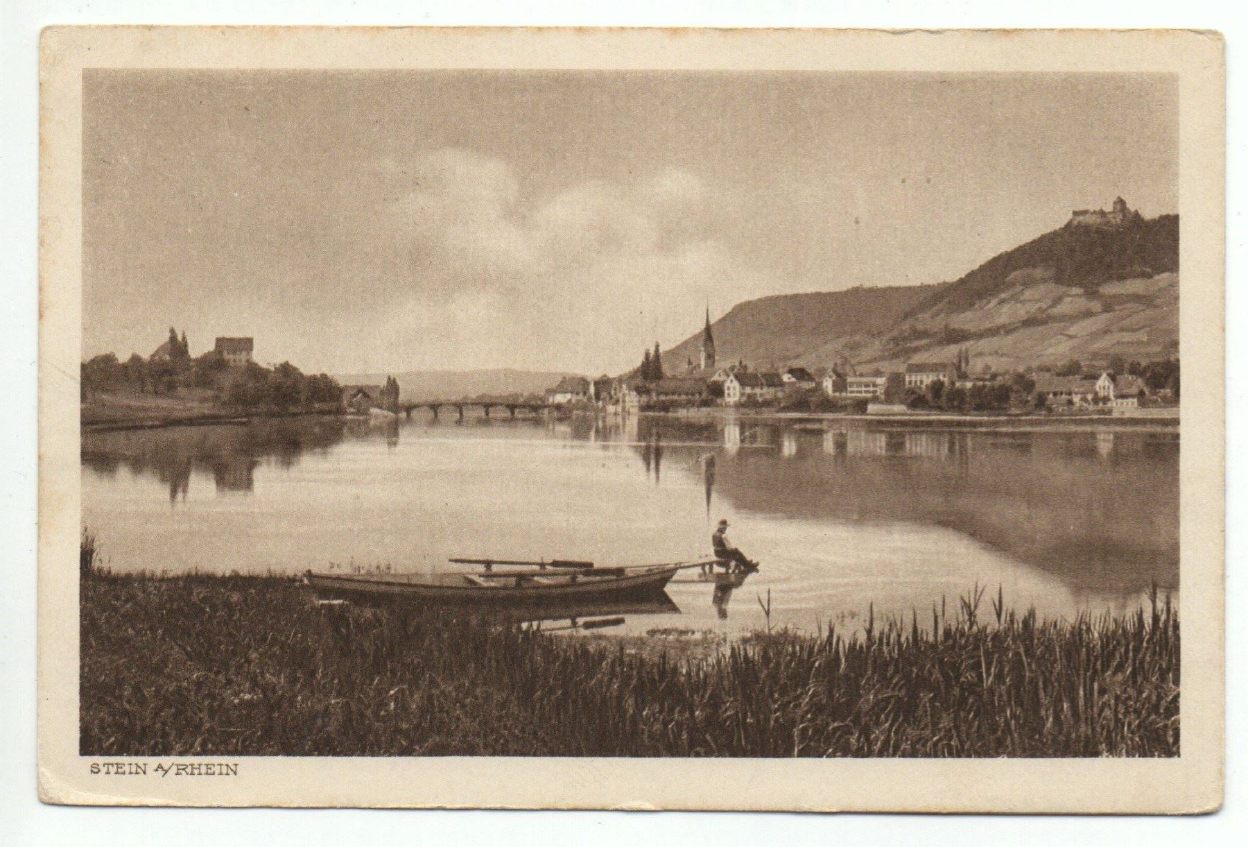 Cartoline postali: STEIN AM RHEIN Mann & Ruderboot am Ufer – Usato da Jona venduto da philajona