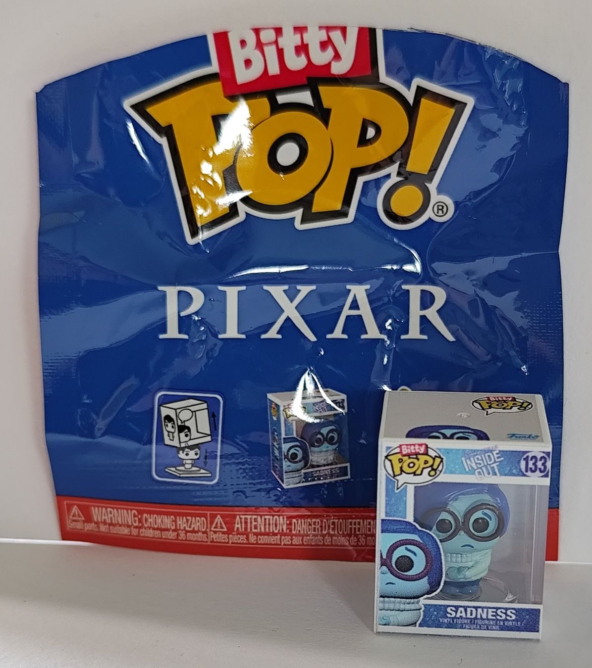 Funko Statuette: PIXAR Blindebag - Ausgepackt! Sadness Bitty Pop Figur – Nuovo (secondo la descrizione) da Bettingen venduto da hamau2012 1