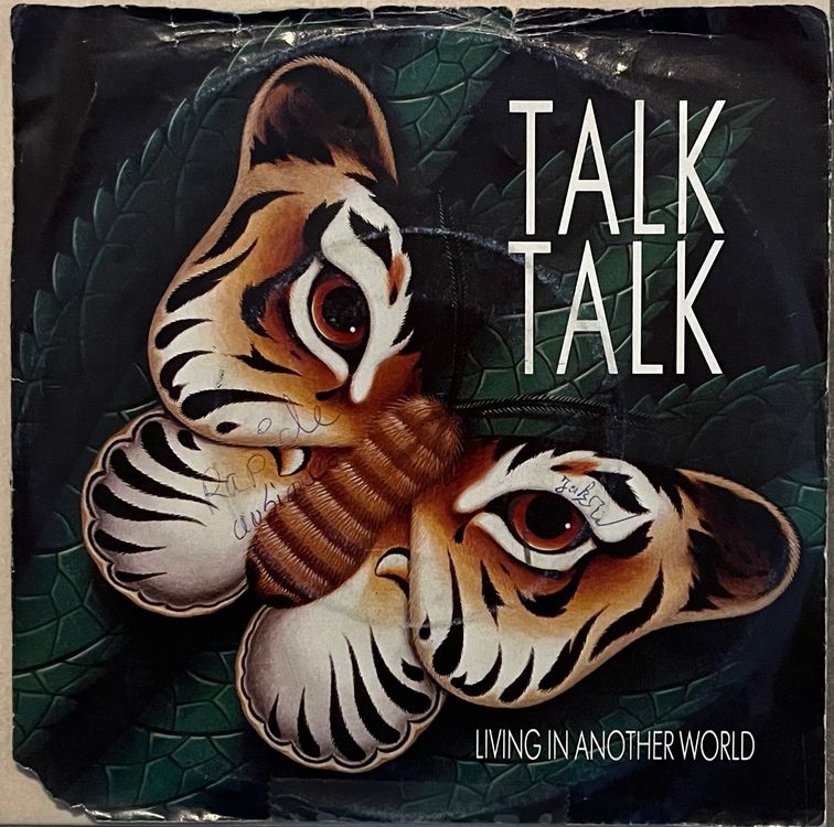 talk talk living in another world letra en español