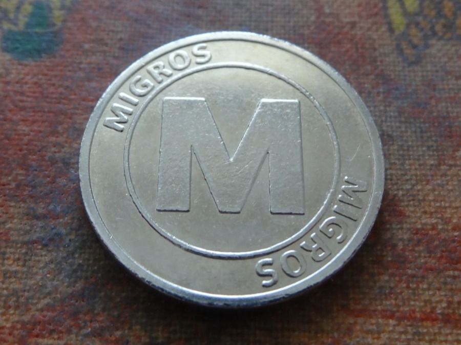 Tutti le monete: Jeton  24mm  " MIGROS "   (K) – Usato da Romanel-sur-Lausanne venduto da Swift13
