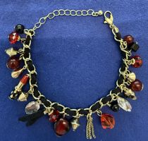 Charm-Armband, goldfarben mit vielen Anhängern