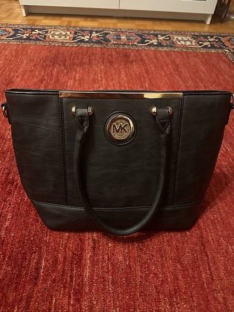 Sac à main Michael Kors noir élégant, très bon état