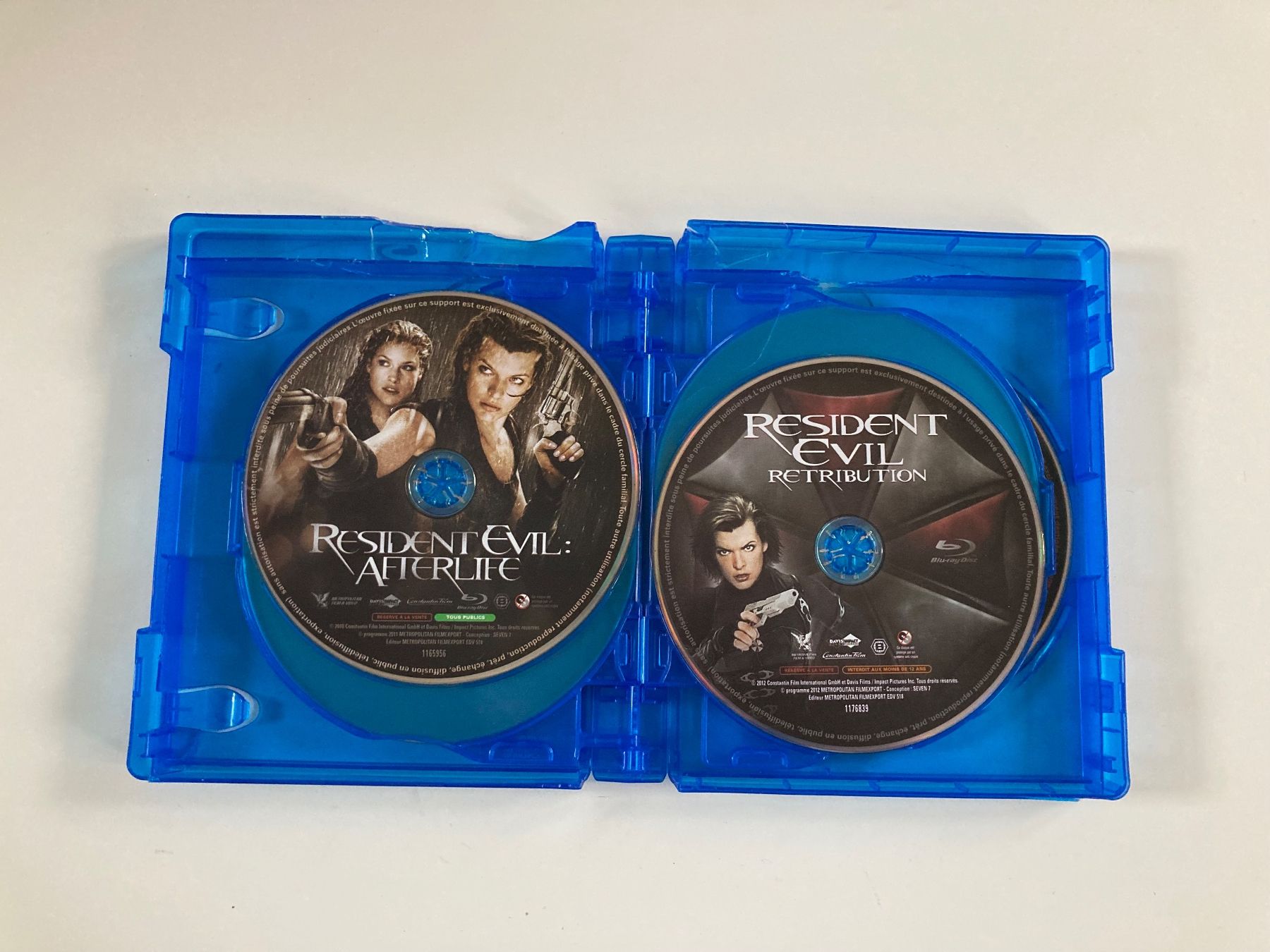 Tutti i DVDs: Coffret Blu-ray Resident Evil La Saga 7 Films – Usato da Bassecourt venduto da CALUMET-X 8