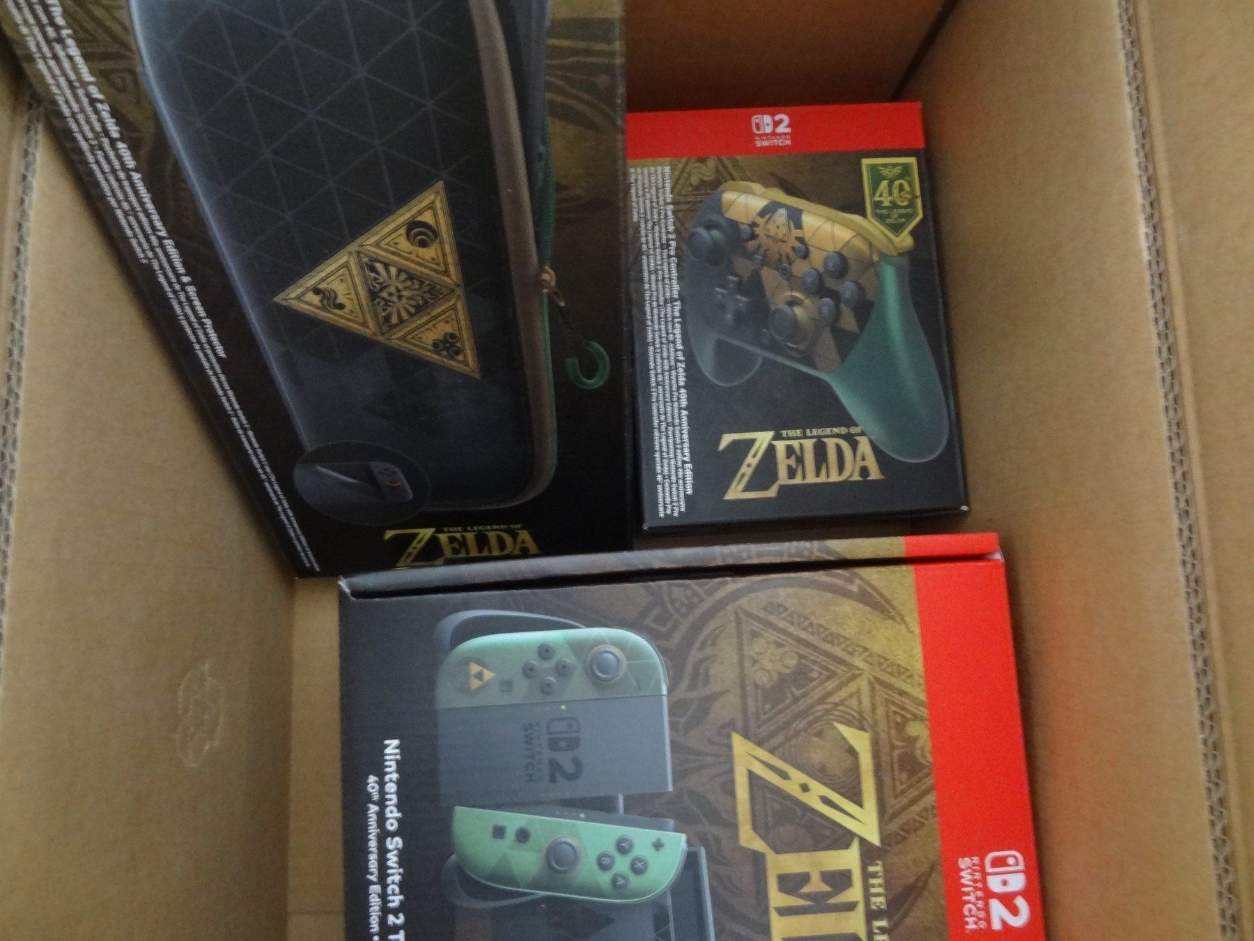 Nintendo Console: Switch 2 Zelda 40th Ann. Ocarina + Pro Controller + Case – Nuovo e nell'imballaggio originale da Lyss venduto da Famicom 1
