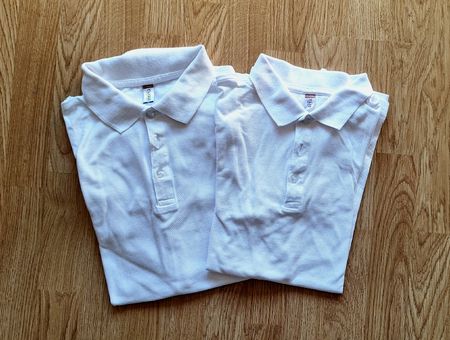2 weisse Poloshirts Gr M