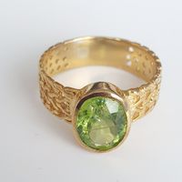 Cocktailring aus 925 Silber vergoldet  mit ein Peridot 20,1m