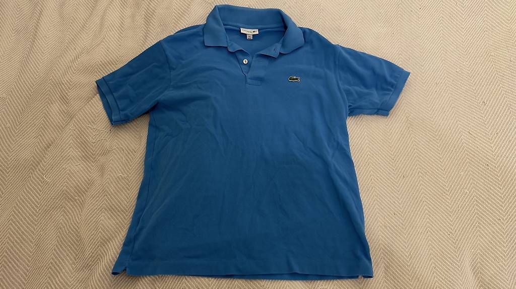 Polo-Shirts: Lacoste, Polo Shirt hellblau – Gebraucht aus Brunnen von sea_c7bm