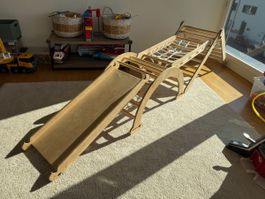 Wooden climbing set with slide and climbing arch natural