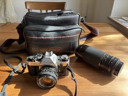 CANON AE-1 PROGRAM inkl. Zoom-Objektiv Tokina AT-X & Tasche
