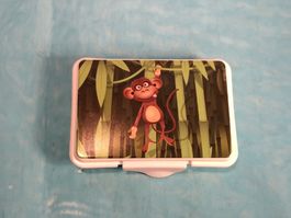 Kleine Lunchbox mit lustigem Affen