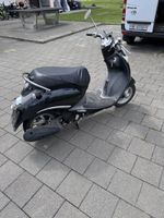 Sym Mio 100
