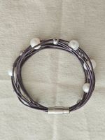 Armband violett Lederoptik mit Perlen