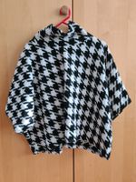 Warmer Strick-Poncho