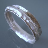 Handgearbeiteter Armreif aus Silber 999