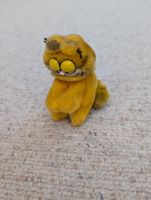 Garfield mit Klemmfunktion mit den Händen, ca. 9cm hoch