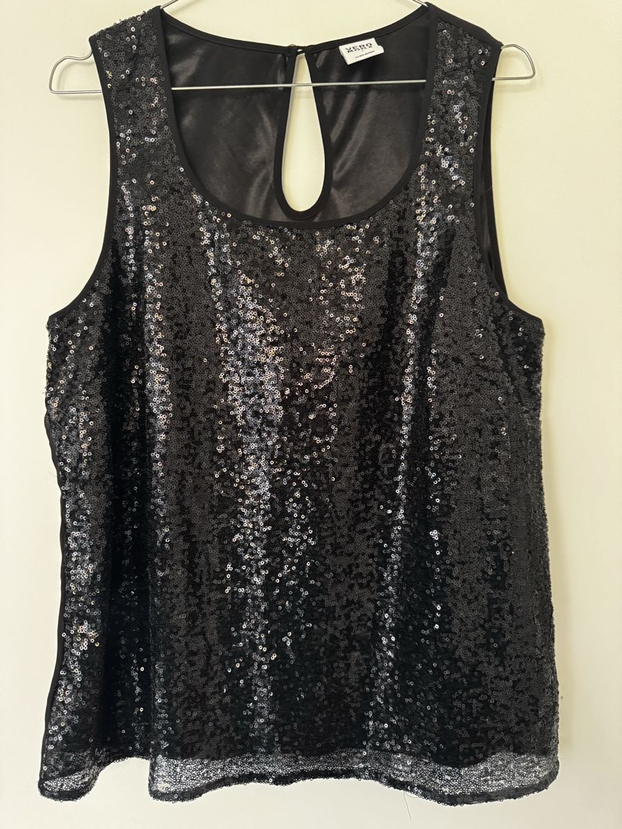 Top: Schwarzes Pailletten-Top GR L – Usato da Zürich venduto da Manubene