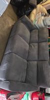 Graues Ecksofa mit Kissen, sehr bequem und gut erhalten.