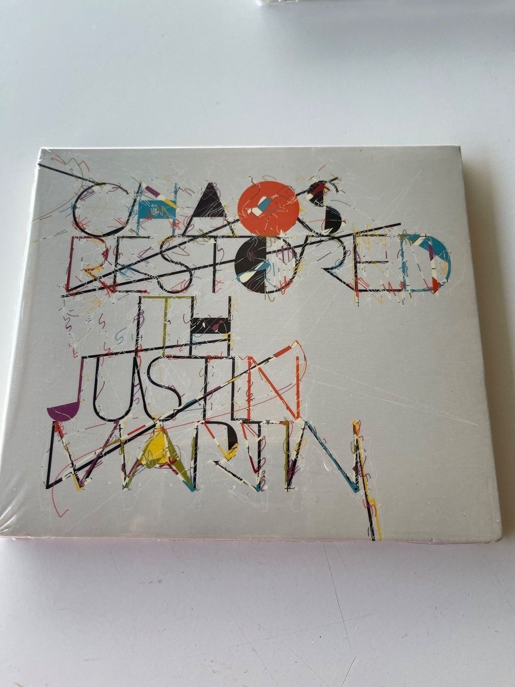 CD: Justin Martin - Chaos Restored – Nuovo e nell'imballaggio originale da Rüti ZH venduto da alumedien
