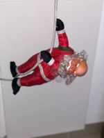 Kletternder Weihnachtsmann