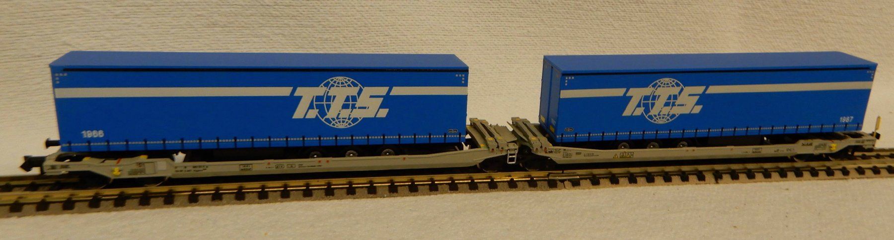 Modellini di ferrovie: Tragwagen mit zwei Hänger – Nuovo e nell'imballaggio originale da Rupperswil venduto da Ropi03