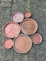 Plastic Saucer Set: 11 pieces.