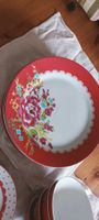 Set di piatti in ceramica con motivo floreale rosso