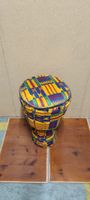 Djembe Trommel mit Tasche und Rhymus Noten.
