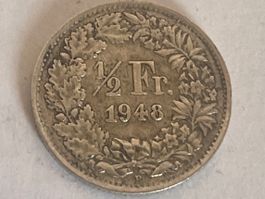 Pièce de 1/2 franc en argent 1948