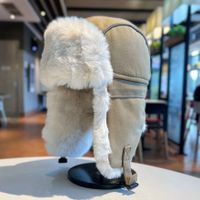 Braune Uschanka-Wintermütze - Bonnet d'hiver Ushanka brun